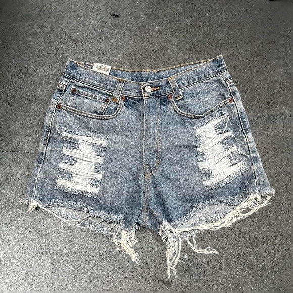 Levi's Pants - Vintage women's Levi's 550 light wash distressed high rise micro shorts 30"